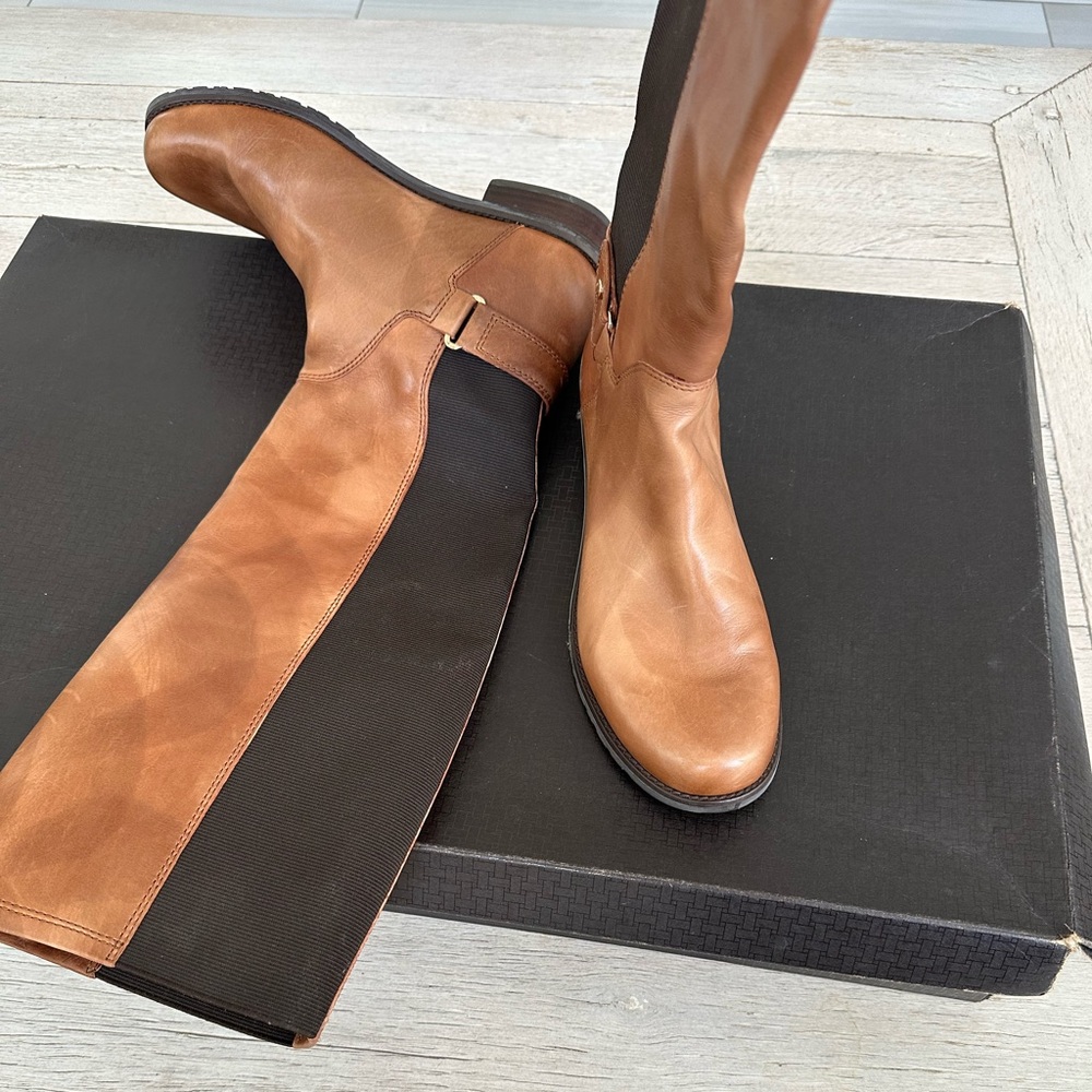 Stuart Weitzman Black and Brown Boots for Versatile Style